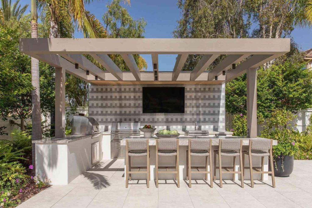 covered pergola with fireplace.