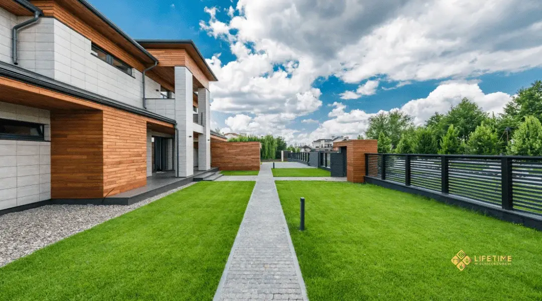 artificial turf backyard with paver edging