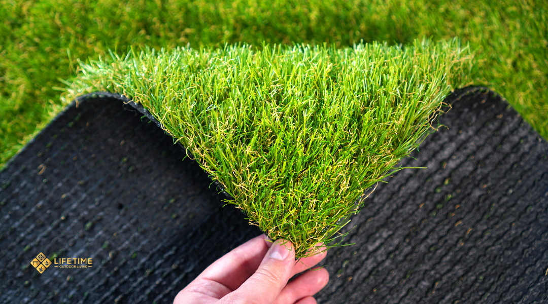 Artificial turf showing problems from poor securing: edges curling, bubbles under surface, seams separating, and water pooling at lifted corners.