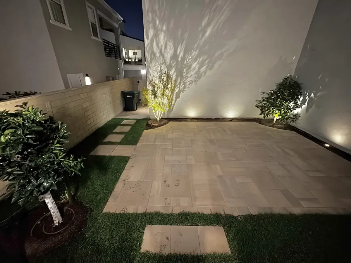 Modern backyard paver patio design in Orange County CA by Lifetime Outdoor Living.